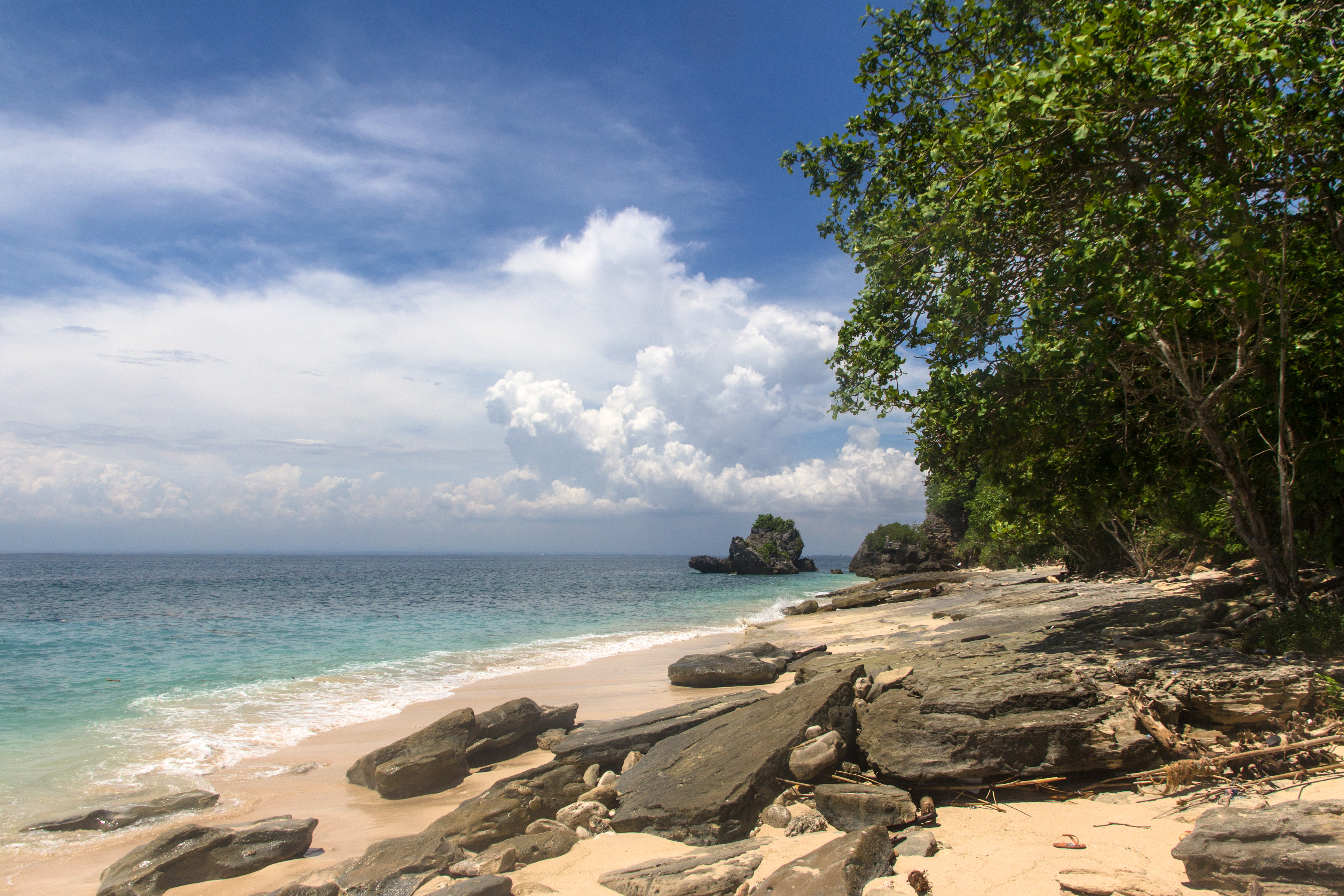 Hidden Gem of Bali: Padang Padang Beach, Serene Paradise Nestled Amongst Limestone Cliffs
